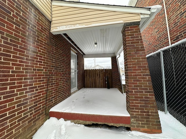 view of snow covered patio