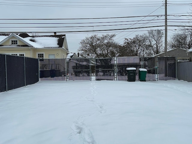 view of yard covered in snow