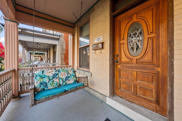 doorway to property with covered porch