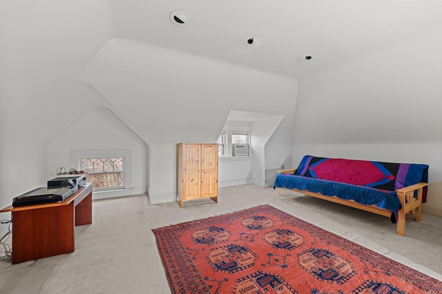 bedroom with cooling unit and lofted ceiling