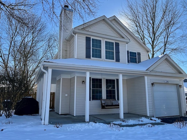 view of front of home featuring a garage