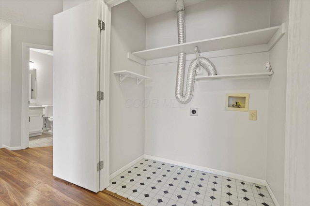 washroom with washer hookup and electric dryer hookup