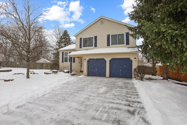 view of front of property featuring a garage