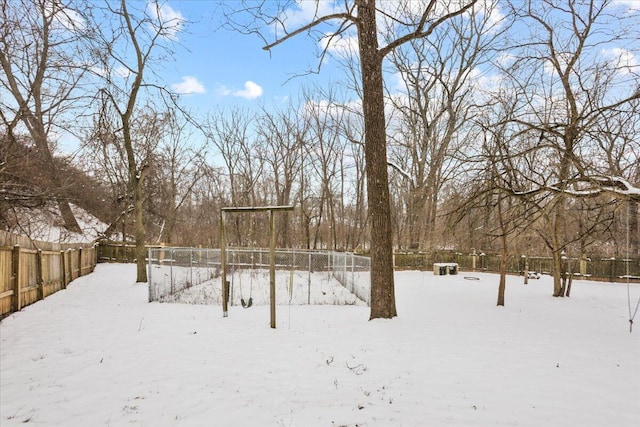 view of yard covered in snow