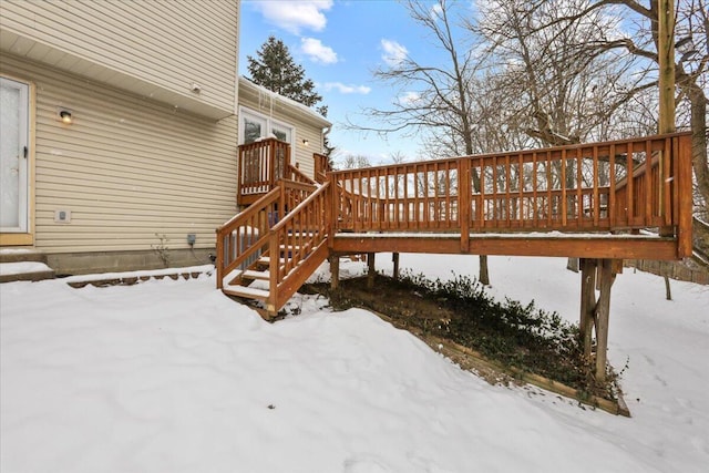 view of snow covered deck