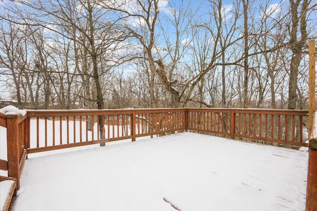 view of snow covered deck