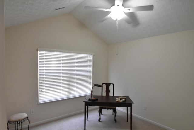 office area with ceiling fan, light carpet, and vaulted ceiling