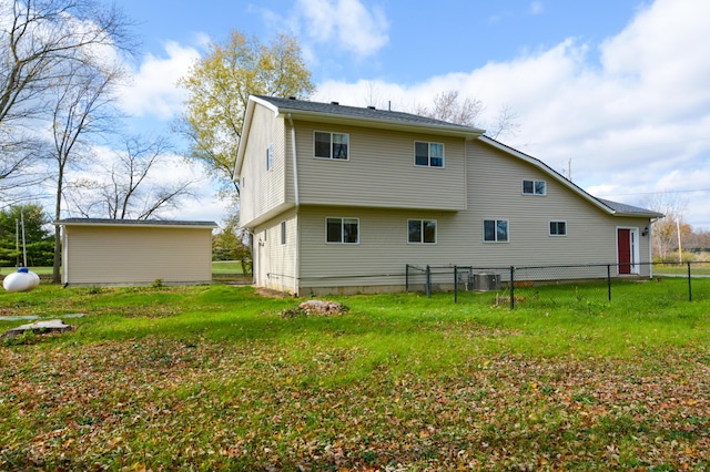 rear view of house with cooling unit