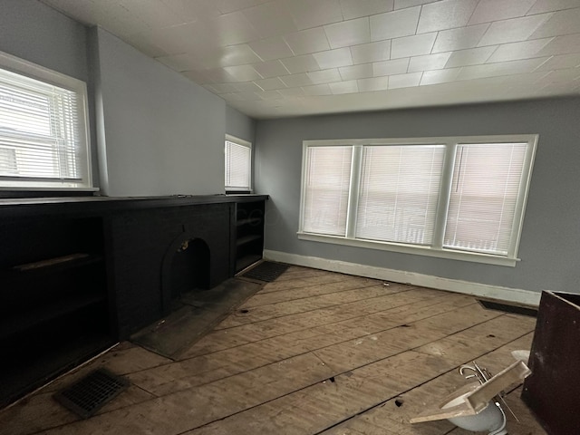 bathroom with hardwood / wood-style flooring