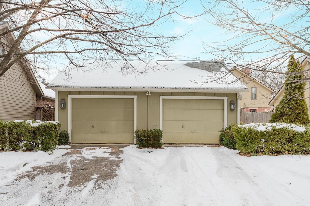 view of snow covered garage