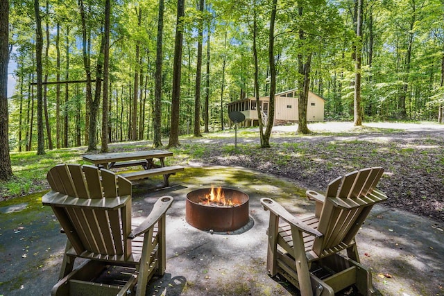 view of patio featuring a fire pit