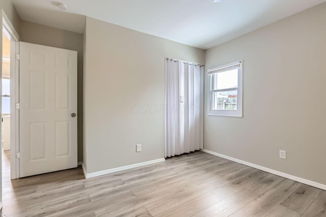 unfurnished bedroom with light hardwood / wood-style flooring