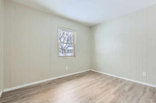 empty room featuring light hardwood / wood-style floors