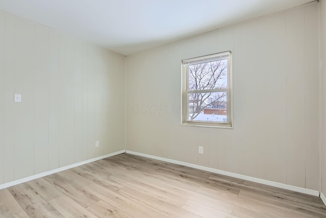 unfurnished room featuring light hardwood / wood-style flooring