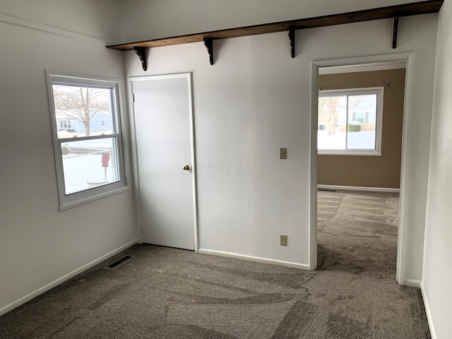 empty room featuring carpet