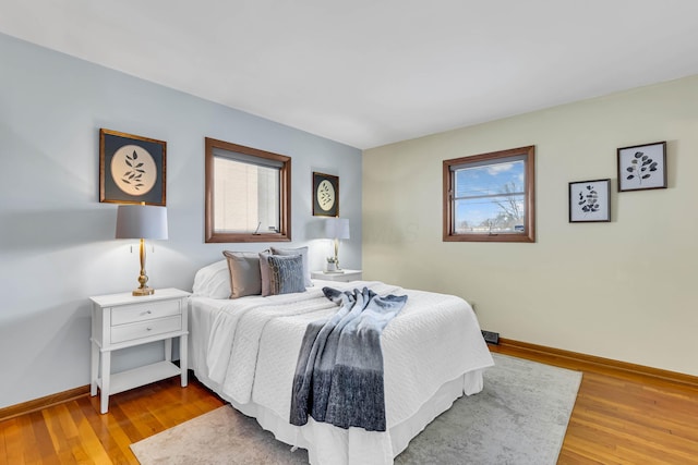 bedroom with light hardwood / wood-style flooring