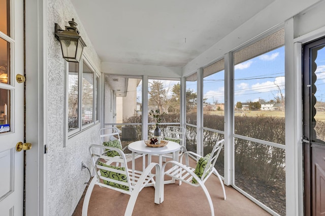 sunroom featuring plenty of natural light