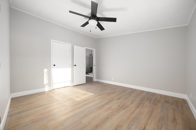 unfurnished bedroom with ceiling fan, crown molding, and light hardwood / wood-style flooring