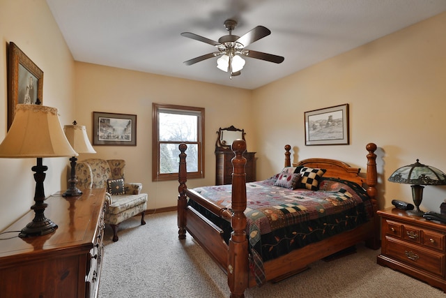 bedroom with light carpet and ceiling fan