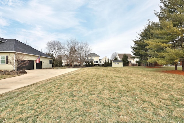 view of yard with a garage