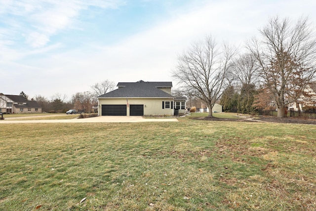 view of yard featuring a garage