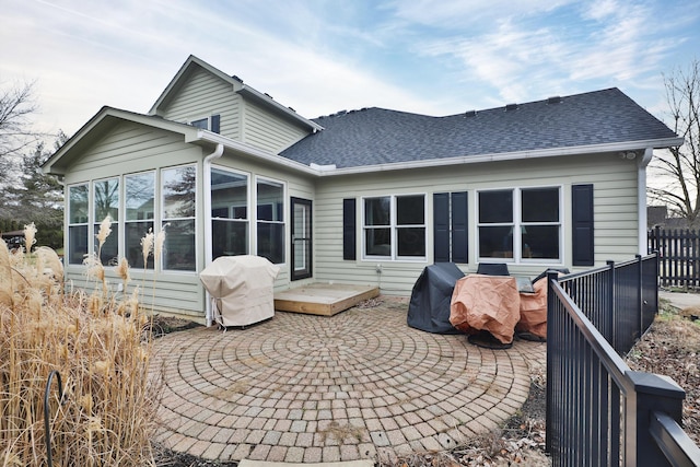 rear view of property with a patio