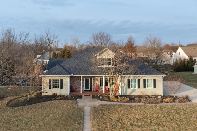 view of front of home with a front lawn