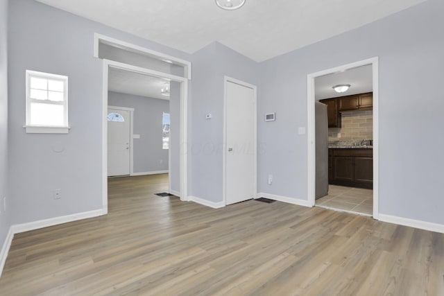 empty room featuring light hardwood / wood-style flooring