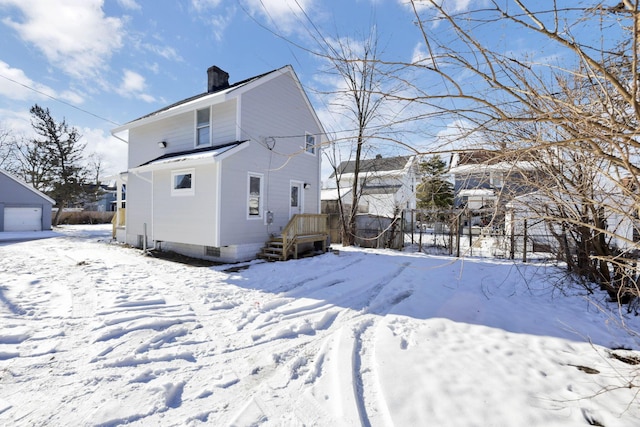 view of snow covered property