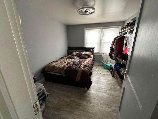 bedroom with hardwood / wood-style flooring