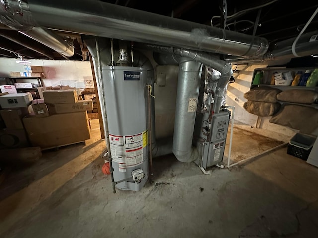 utilities featuring heating unit and gas water heater