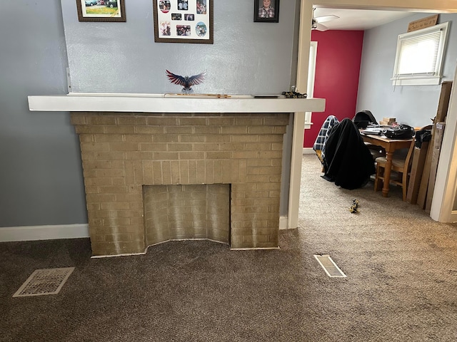 details featuring carpet and a brick fireplace