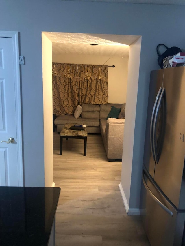 corridor featuring hardwood / wood-style flooring