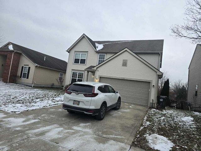 front of property featuring a garage