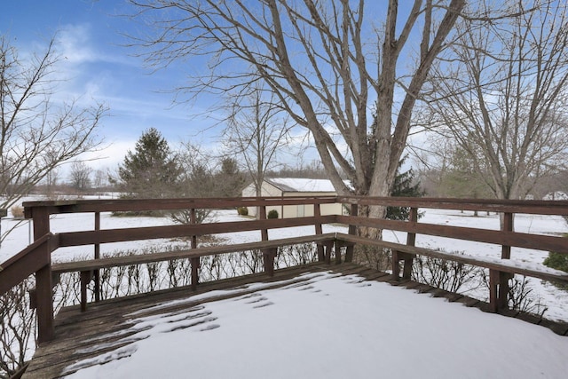 view of snow covered deck