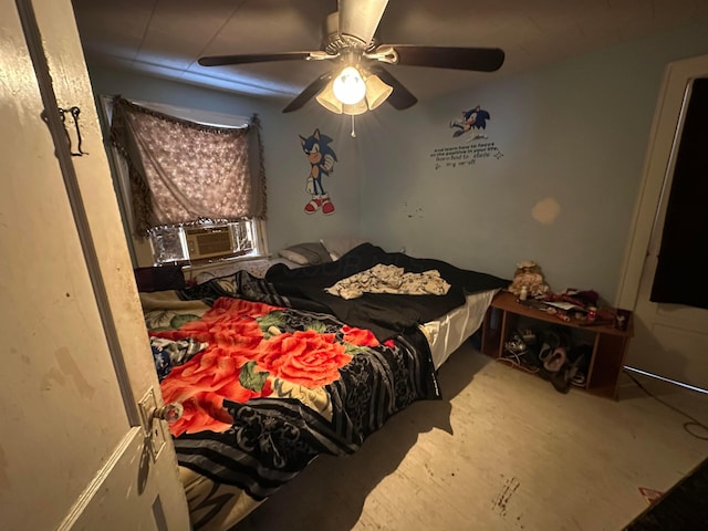 bedroom featuring ceiling fan and cooling unit