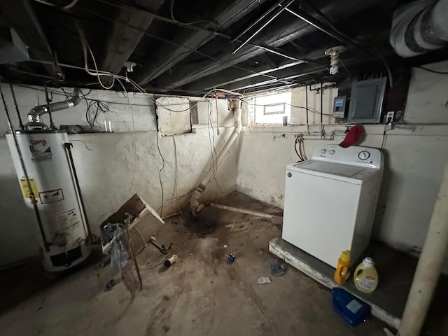 basement featuring electric panel, washer / dryer, and gas water heater