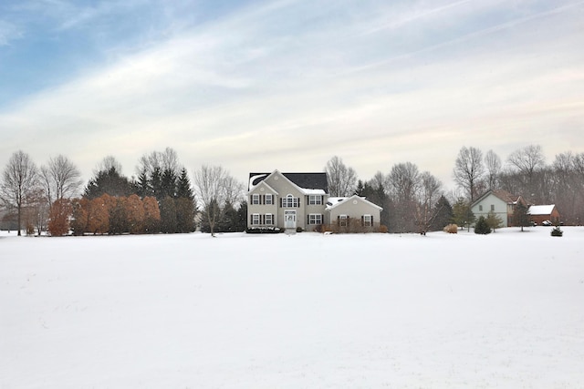 view of yard layered in snow