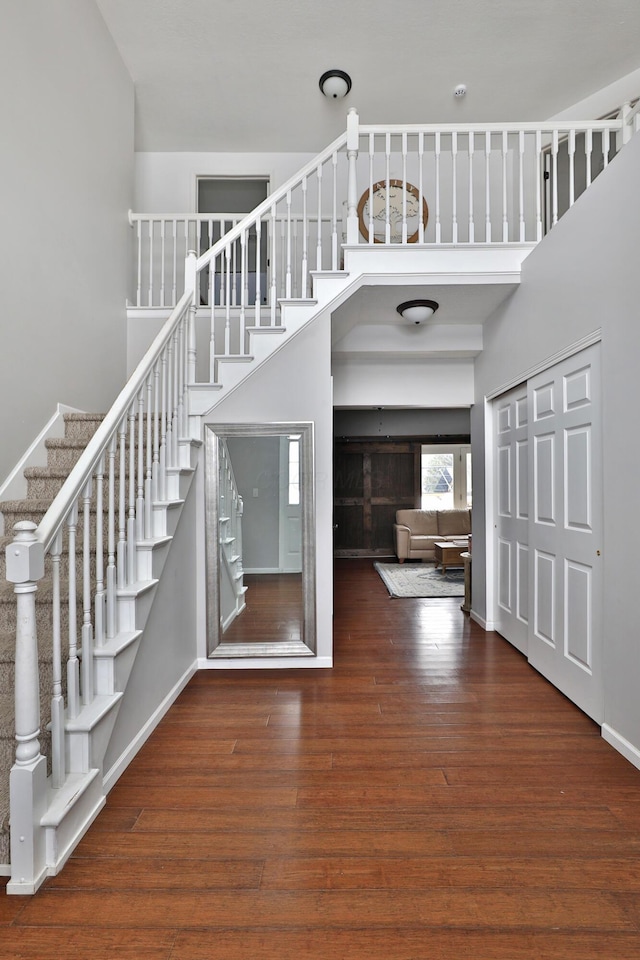 entrance foyer featuring dark hardwood / wood-style floors