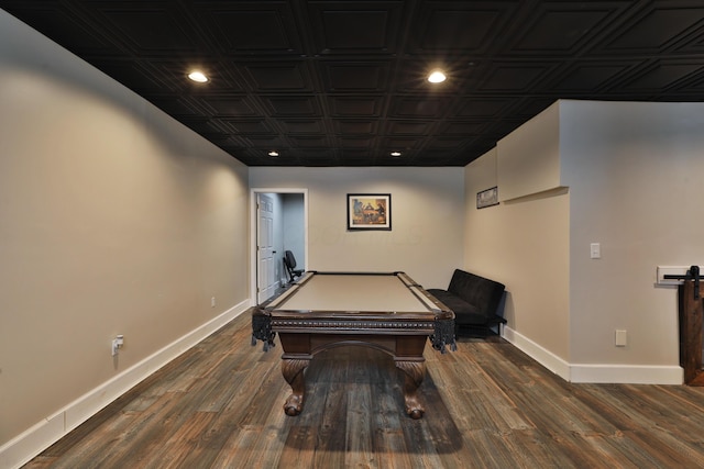 rec room featuring pool table, a barn door, and dark hardwood / wood-style flooring