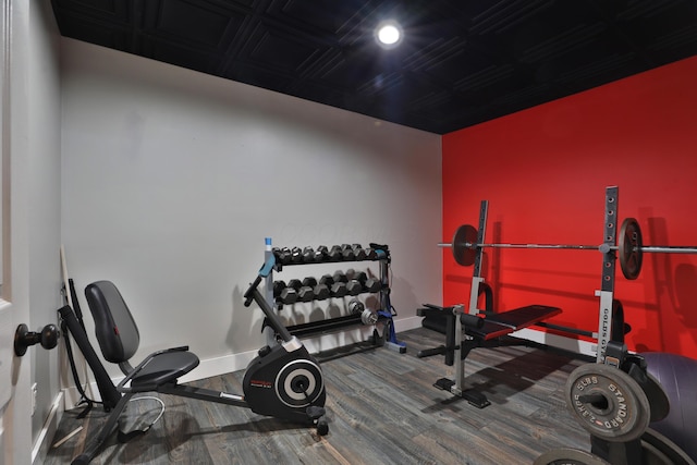 workout area featuring hardwood / wood-style floors