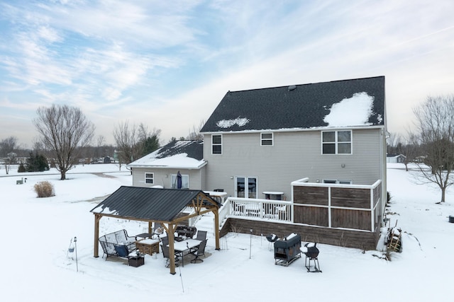 view of snow covered house