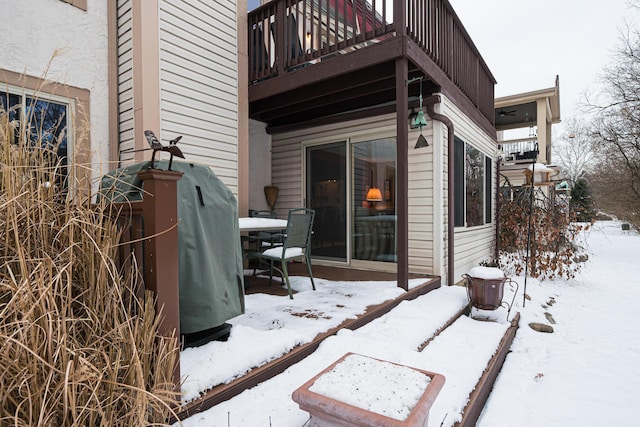 view of snow covered property