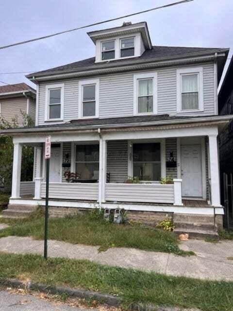 view of front of home featuring covered porch