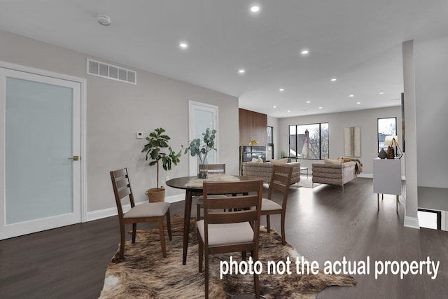 dining area with baseboards, dark wood-style flooring, visible vents, and recessed lighting