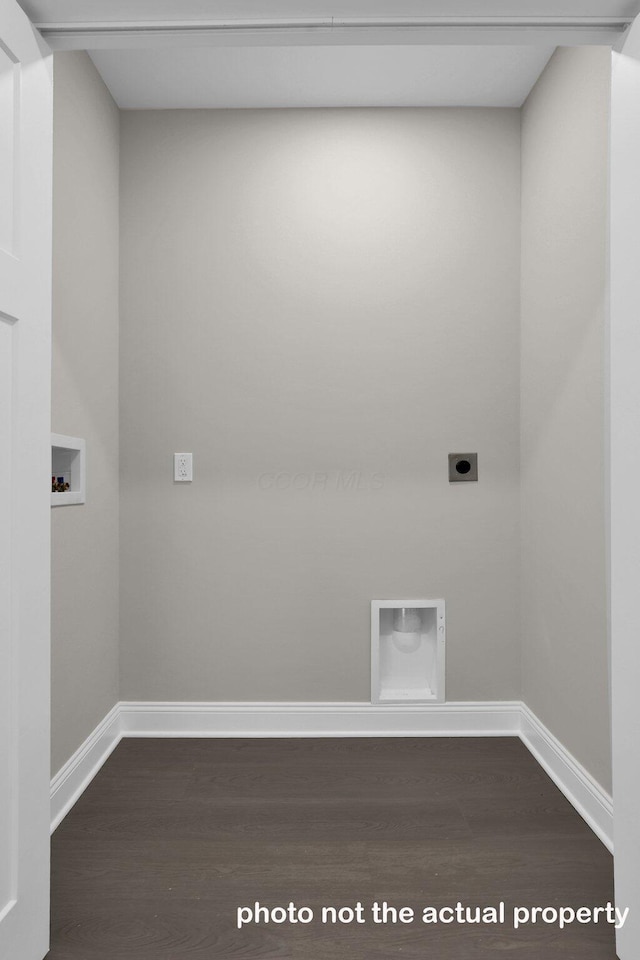 clothes washing area with baseboards, washer hookup, dark wood-style flooring, and hookup for an electric dryer