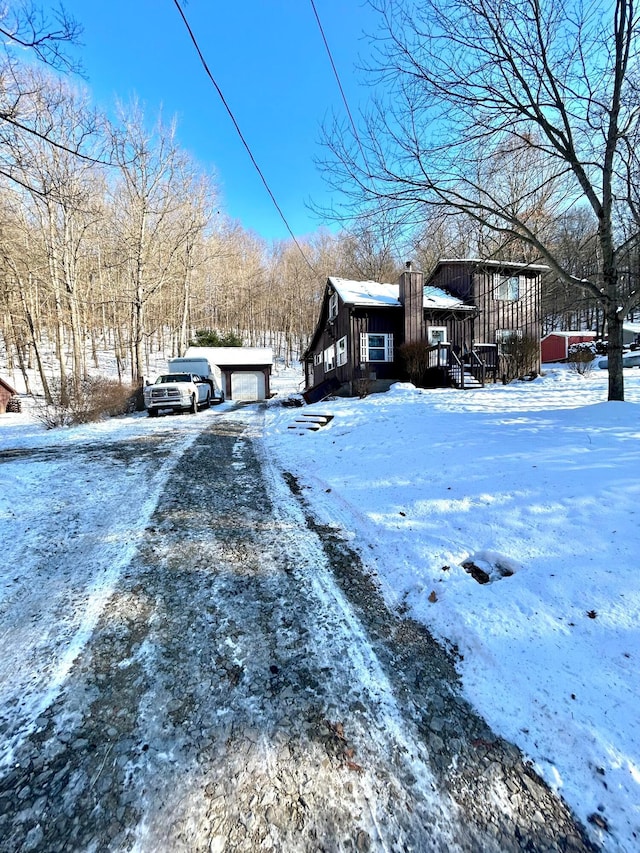 view of yard layered in snow