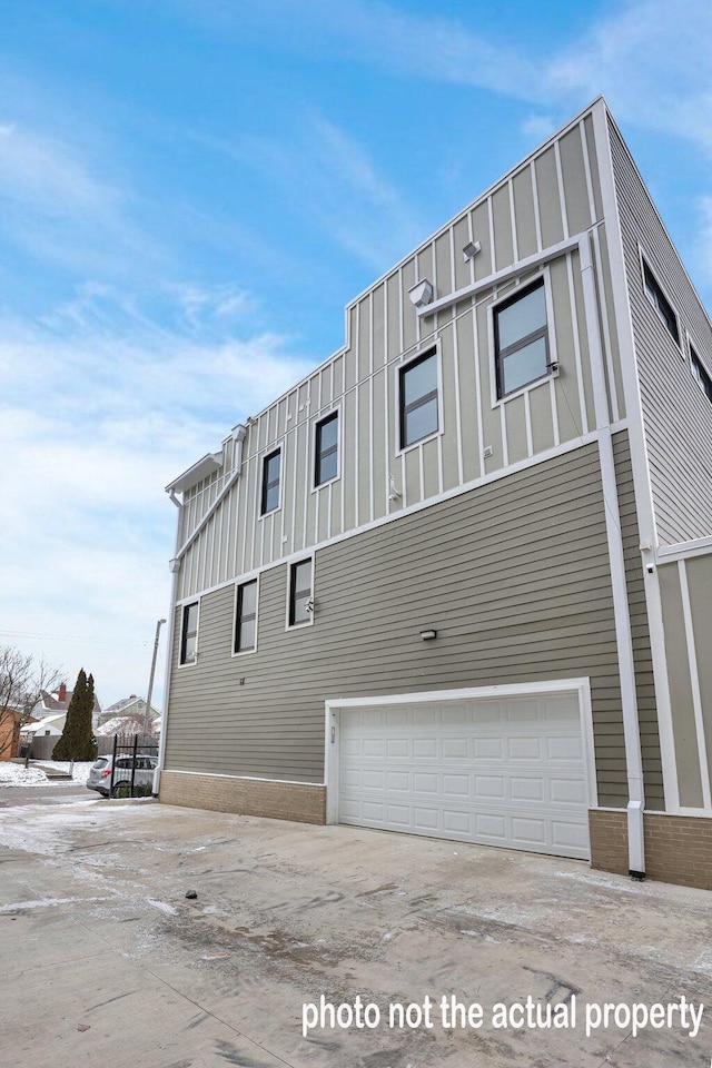 view of property exterior featuring a garage