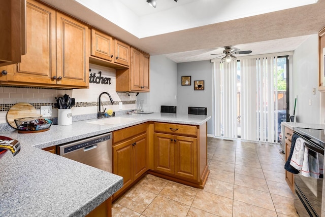 kitchen with sink, stainless steel dishwasher, ceiling fan, electric range, and kitchen peninsula