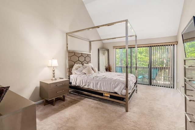 carpeted bedroom featuring access to outside and vaulted ceiling